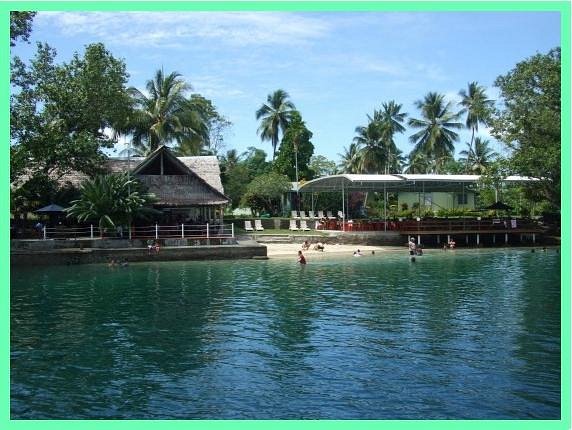 Beachfront bungalows and lawns at Jais Aben Resort on the north coast